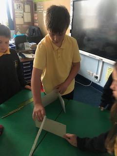 Designing our own Investigation to Prove Light Travels in Straight Lines